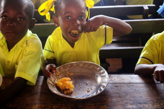 Haiti south girl eat lunch cute smile 2020