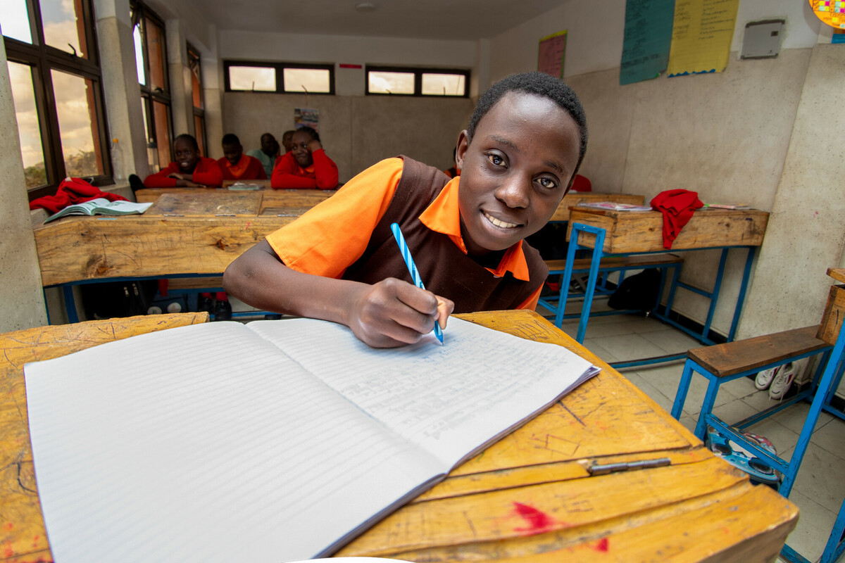 Kenya Nairobi Rehema Classroom smile book write education