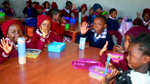 Students enjoying lunchtime together at St. Theresa’s School, Zambia.