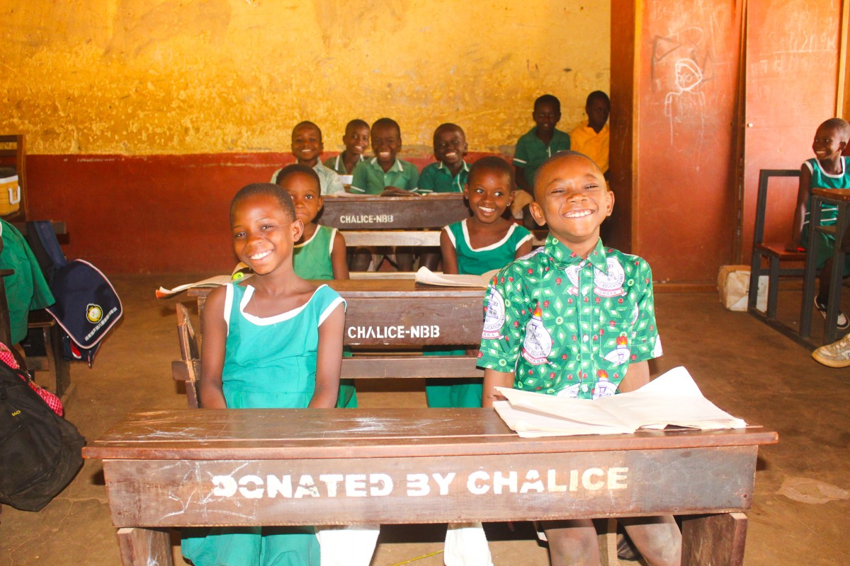 STUDENTS OF ST PAUL’S TAKING LESSONS ON THEIR DESKS Ghana